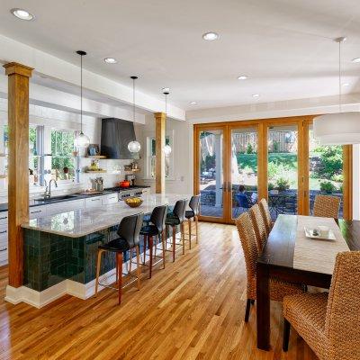 Dining and kitchen area with doors to an outside patio